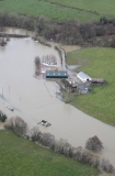 Aerial picture of the river out of bank with water over the floodplain